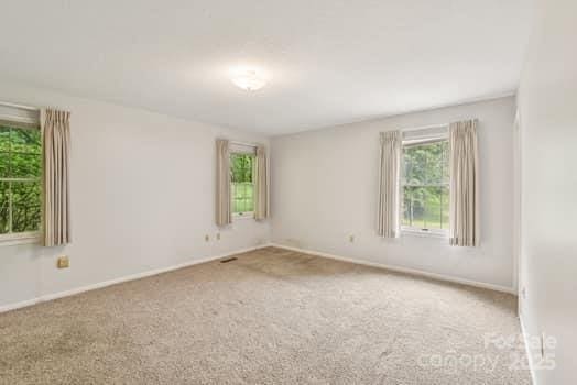 125 Merrill Rd, Fletcher, NC 28732 - carpeted empty room with baseboards