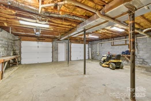 125 Merrill Rd, Fletcher, NC 28732 - garage featuring a garage door opener