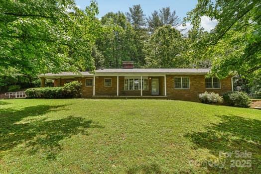 125 Merrill Rd, Fletcher, NC 28732 - single story home featuring a front yard