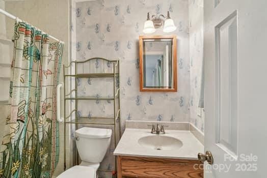 125 Merrill Rd, Fletcher, NC 28732 - bathroom with toilet, vanity, and a shower with curtain