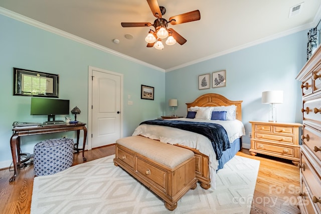 3500 Maple Wood Dr, Denver, NC 28037 - bedroom featuring ornamental molding, wood finished floors, baseboards, a ceiling fan, and an office area