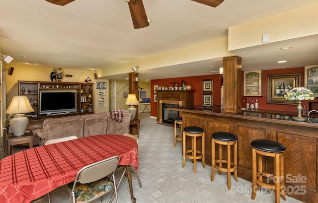 4471 Cove Loop Rd, Hendersonville, NC 28739 - dining room with bar, a fireplace, recessed lighting, and carpet flooring
