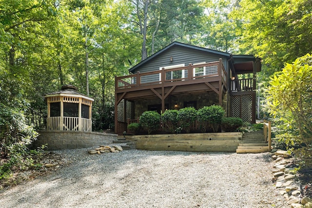 153 Buckner Rd, Black Mountain, NC 28711 - rustic home with stone siding, a deck, and a gazebo