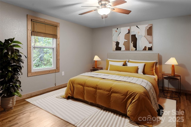 153 Buckner Rd, Black Mountain, NC 28711 - bedroom with wood finished floors and a ceiling fan