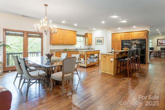 75 Cougar Ln, Saluda, NC 28773 - dining area featuring ornamental molding, dark wood-style flooring, a chandelier, recessed lighting, and french doors