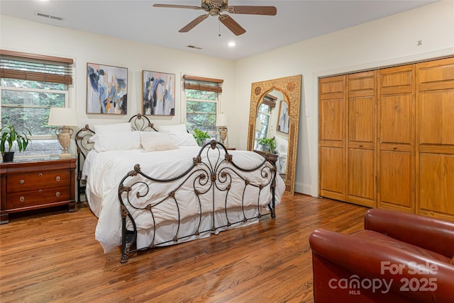 75 Cougar Ln, Saluda, NC 28773 - bedroom with wood finished floors, recessed lighting, ceiling fan, and a closet