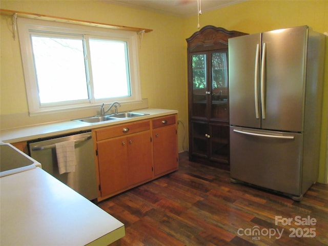 1051 S Brady Ave, Newton, NC 28658 - kitchen with appliances with stainless steel finishes, a sink, dark wood finished floors, healthy amount of natural light, and crown molding