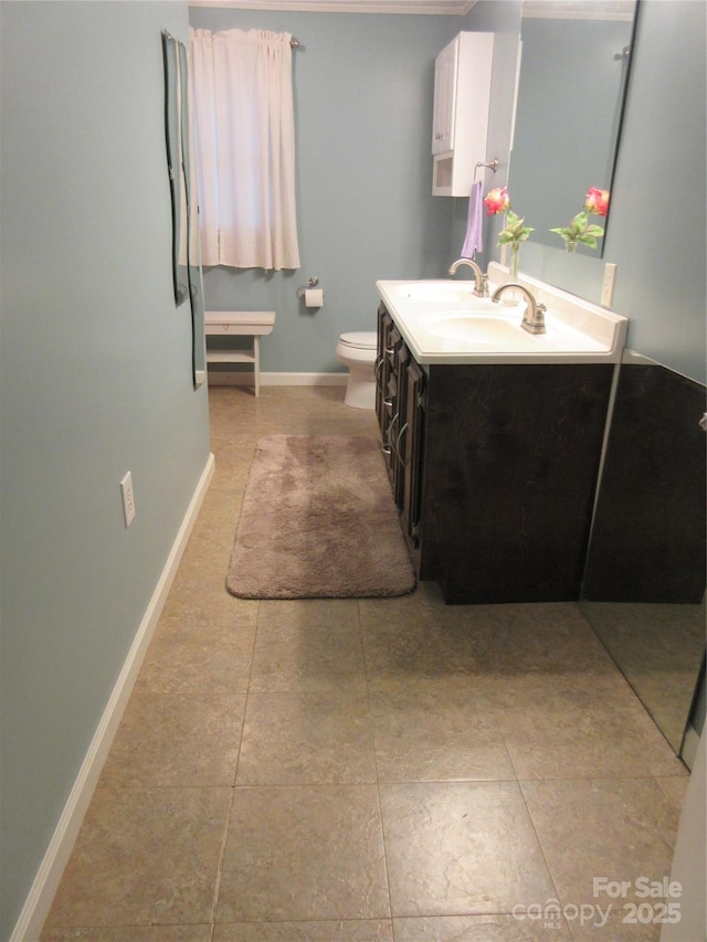 1051 S Brady Ave, Newton, NC 28658 - bathroom with vanity, toilet, baseboards, and tile patterned floors