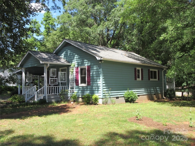 1051 S Brady Ave, Newton, NC 28658 - view of front of house with crawl space, a front lawn, and covered porch