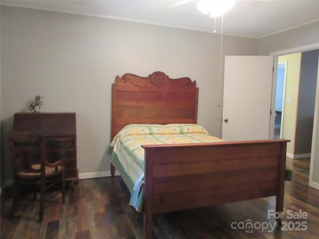 1051 S Brady Ave, Newton, NC 28658 - bedroom with dark wood-type flooring, ornamental molding, baseboards, and ceiling fan