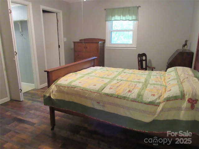 1051 S Brady Ave, Newton, NC 28658 - bedroom with wood finished floors and baseboards