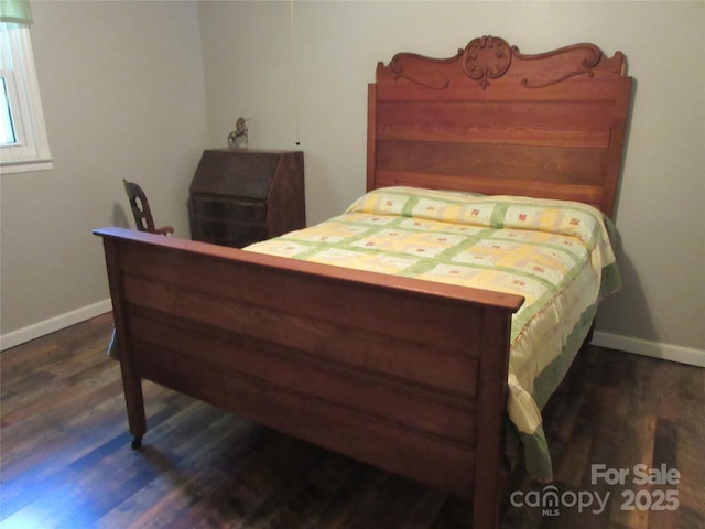 1051 S Brady Ave, Newton, NC 28658 - bedroom with baseboards and dark wood finished floors