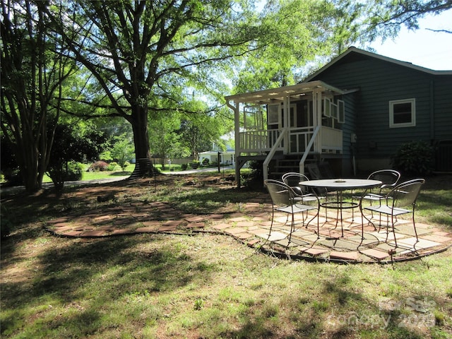 1051 S Brady Ave, Newton, NC 28658 - view of yard with a patio and a sunroom