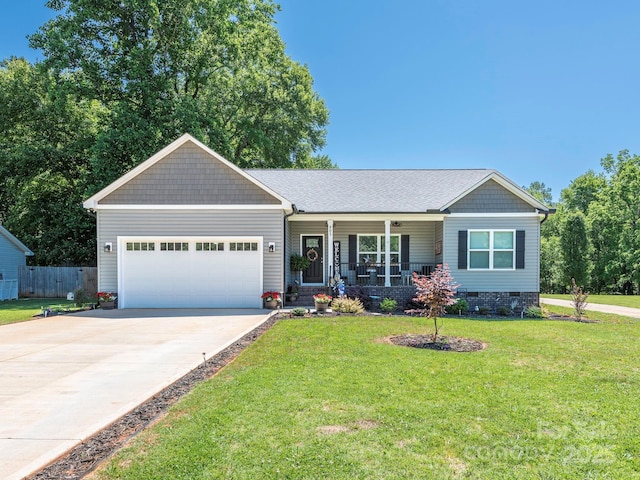 805 Brookmont Ave, Salisbury, NC 28146 - view of front of house featuring covered porch, a garage, concrete driveway, crawl space, and roof with shingles
