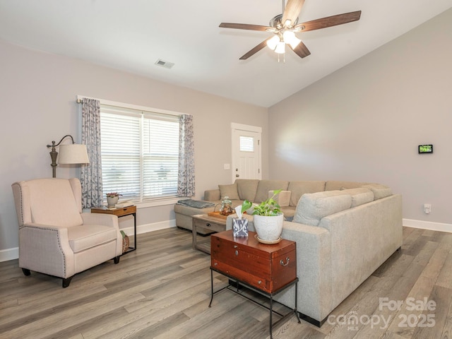 805 Brookmont Ave, Salisbury, NC 28146 - living room featuring baseboards, wood finished floors, a ceiling fan, and vaulted ceiling
