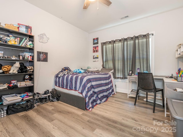 805 Brookmont Ave, Salisbury, NC 28146 - bedroom with wood finished floors, a ceiling fan, and an office area