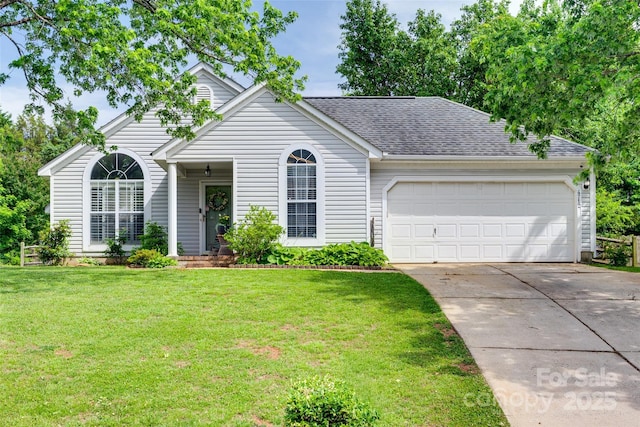 4712 Avalon Forest Ln, Charlotte, NC 28269 - view of front of house featuring a garage, concrete driveway, a front yard, and a shingled roof