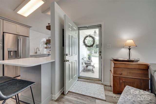 4712 Avalon Forest Ln, Charlotte, NC 28269 - entryway featuring light wood finished floors and baseboards