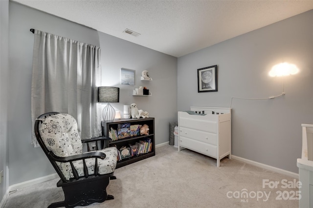 4712 Avalon Forest Ln, Charlotte, NC 28269 - living area featuring carpet floors, baseboards, and a textured ceiling