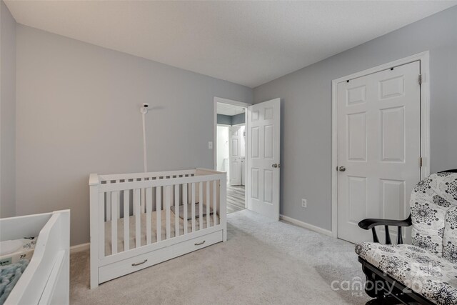 4712 Avalon Forest Ln, Charlotte, NC 28269 - carpeted bedroom with baseboards