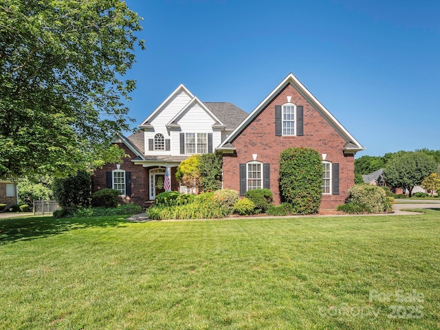 725 Old State St SW, Concord, NC 28027 - traditional-style house featuring brick siding and a front lawn