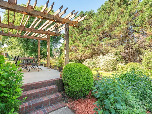 725 Old State St SW, Concord, NC 28027 - wooden deck featuring a pergola and a patio