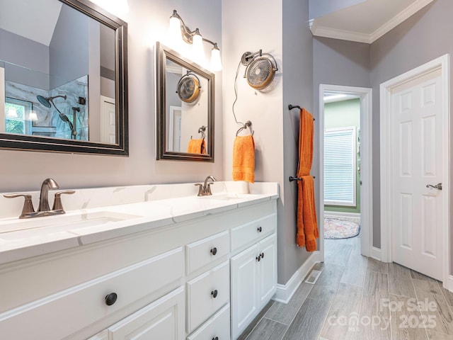 725 Old State St SW, Concord, NC 28027 - full bath with double vanity, tiled shower, crown molding, wood finished floors, and baseboards