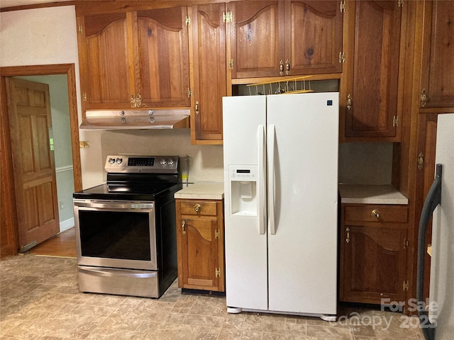 1614 Statesville Blvd, Salisbury, NC 28144 - kitchen featuring white refrigerator with ice dispenser, stainless steel range with electric stovetop, under cabinet range hood, refrigerator, and brown cabinetry