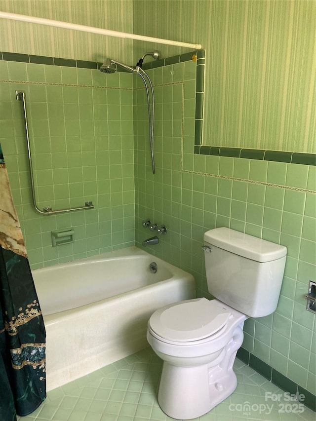 1614 Statesville Blvd, Salisbury, NC 28144 - full bathroom with tile patterned floors, shower / tub combo with curtain, tile walls, and wallpapered walls