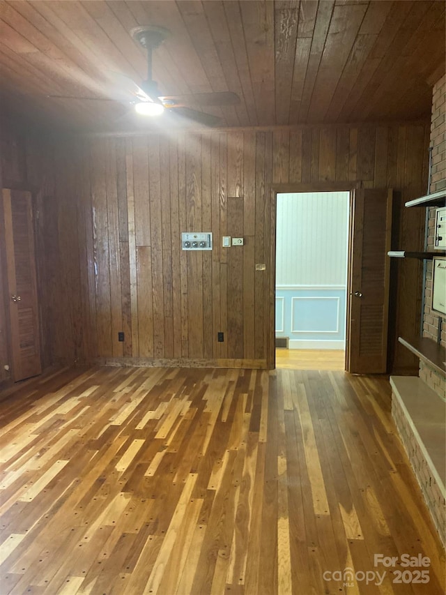 1614 Statesville Blvd, Salisbury, NC 28144 - unfurnished room featuring wooden ceiling, hardwood / wood-style flooring, a ceiling fan, and wood walls