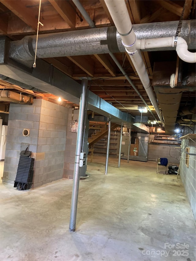 1614 Statesville Blvd, Salisbury, NC 28144 - unfinished basement featuring stairway and heating unit