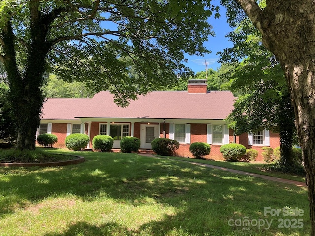 1614 Statesville Blvd, Salisbury, NC 28144 - single story home featuring brick siding, a chimney, and a front yard