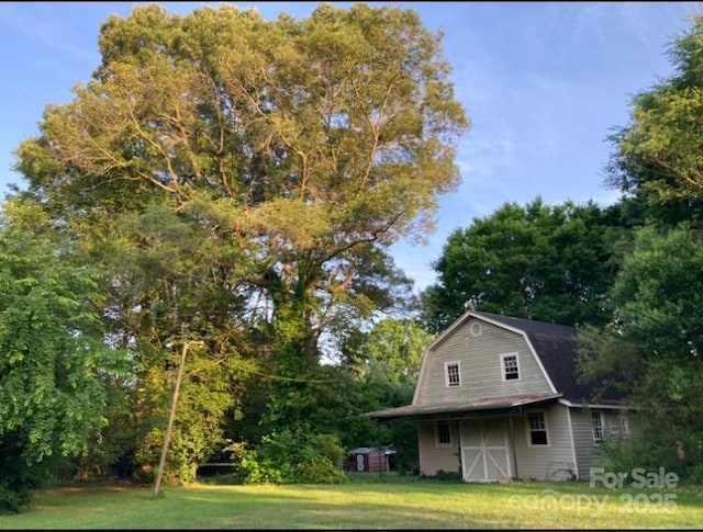 1614 Statesville Blvd, Salisbury, NC 28144 - view of grassy yard with a barn and an outbuilding