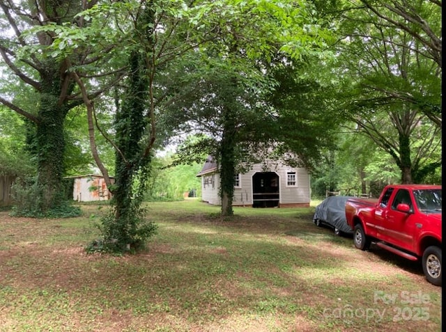 1614 Statesville Blvd, Salisbury, NC 28144 - view of grassy yard featuring a shed