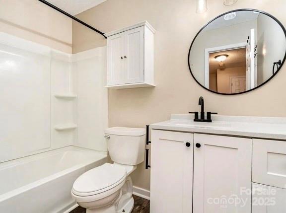 3572 Heather Ln, Gastonia, NC 28056 - bathroom with vanity, toilet, shower / tub combination, and baseboards