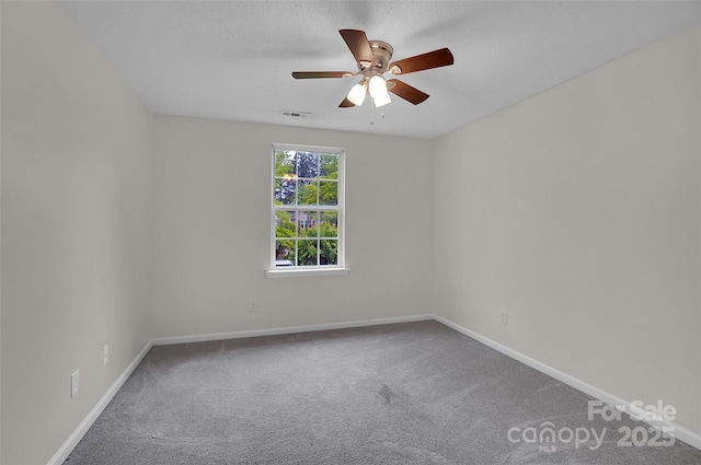 5237 Ficus Tree Ln, Charlotte, NC 28215 - spare room featuring carpet floors and ceiling fan