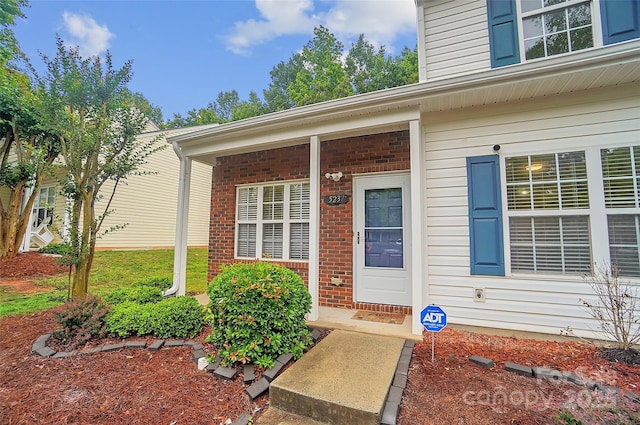 5237 Ficus Tree Ln, Charlotte, NC 28215 - entrance to property with brick siding and covered porch
