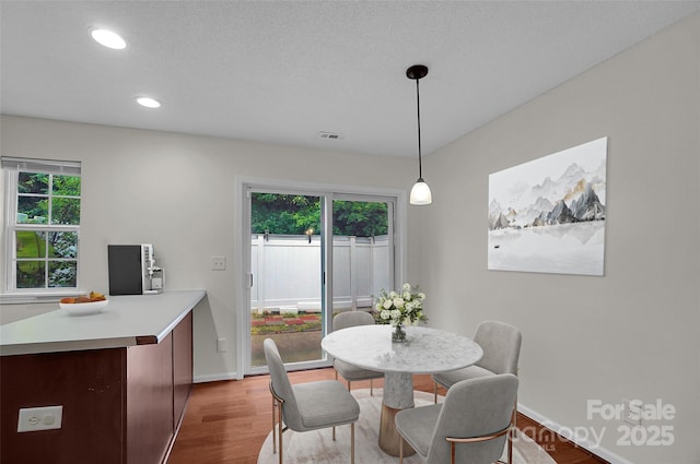 5237 Ficus Tree Ln, Charlotte, NC 28215 - dining space featuring wood finished floors and recessed lighting