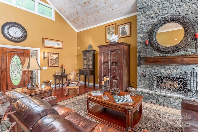 1706 Rock House Cove Rd, Clyde, NC 28721 - living area featuring high vaulted ceiling, wood finished floors, wood ceiling, crown molding, and a fireplace