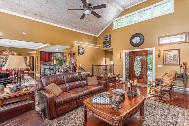 1706 Rock House Cove Rd, Clyde, NC 28721 - living room featuring high vaulted ceiling, wood finished floors, ceiling fan, baseboards, and wood ceiling with exposed beams