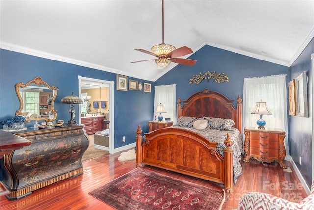 1706 Rock House Cove Rd, Clyde, NC 28721 - bedroom with wood finished floors, vaulted ceiling, baseboards, ensuite bath, and a ceiling fan