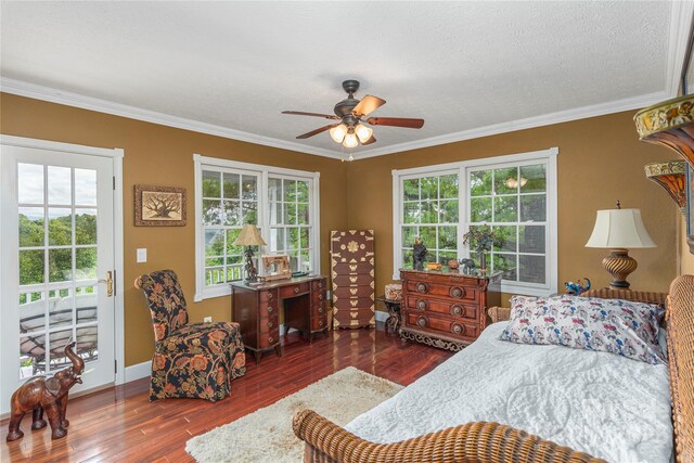 1706 Rock House Cove Rd, Clyde, NC 28721 - bedroom with wood finished floors, crown molding, ceiling fan, baseboards, and a textured ceiling