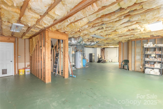 1706 Rock House Cove Rd, Clyde, NC 28721 - unfinished basement with electric water heater