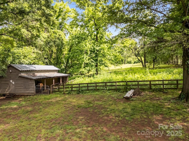 1433 Kern Carlton Rd, Salisbury, NC 28146 - view of yard featuring an outdoor structure and a forest view