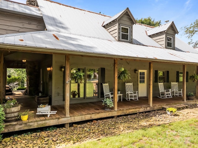 1433 Kern Carlton Rd, Salisbury, NC 28146 - rear view of property with covered porch and a metal roof
