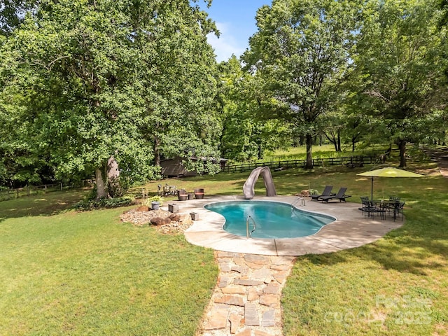 1433 Kern Carlton Rd, Salisbury, NC 28146 - view of swimming pool with a patio, a water slide, and view of scattered trees