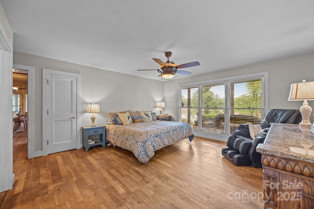 1433 Kern Carlton Rd, Salisbury, NC 28146 - bedroom with light wood finished floors and a ceiling fan