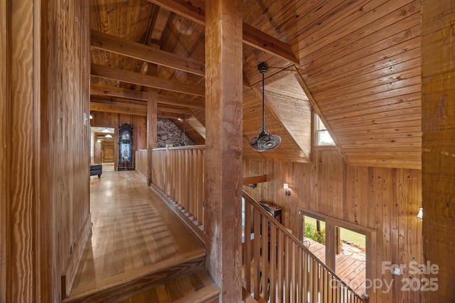 1433 Kern Carlton Rd, Salisbury, NC 28146 - hall with an upstairs landing, wooden ceiling, wood walls, and wood finished floors