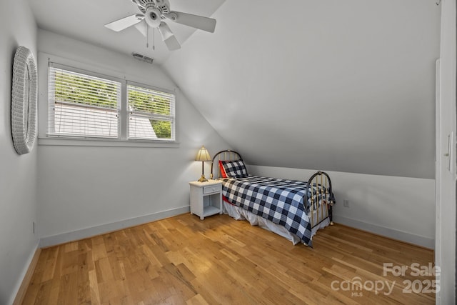 1433 Kern Carlton Rd, Salisbury, NC 28146 - bedroom featuring lofted ceiling, light wood-style floors, and a ceiling fan