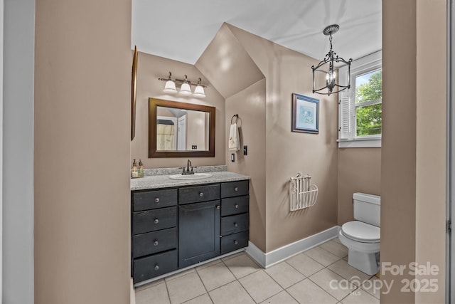 1433 Kern Carlton Rd, Salisbury, NC 28146 - bathroom with vanity, tile patterned flooring, a chandelier, and vaulted ceiling